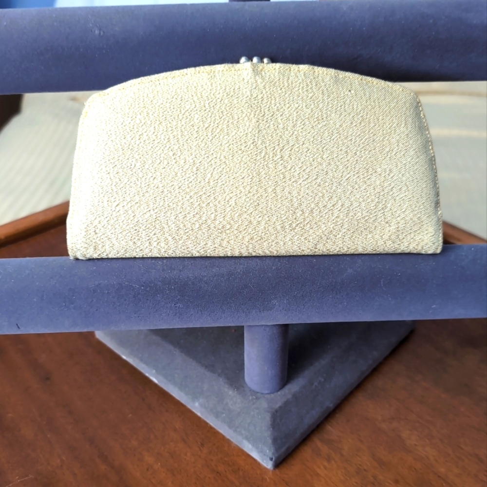 Vintage Baronet Gold Leather Clutch.